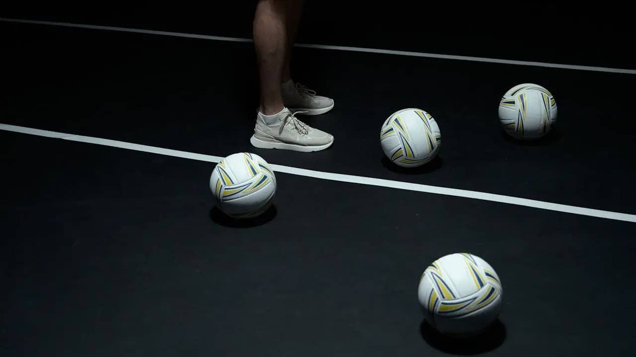 Volleyball player spiking a ball
